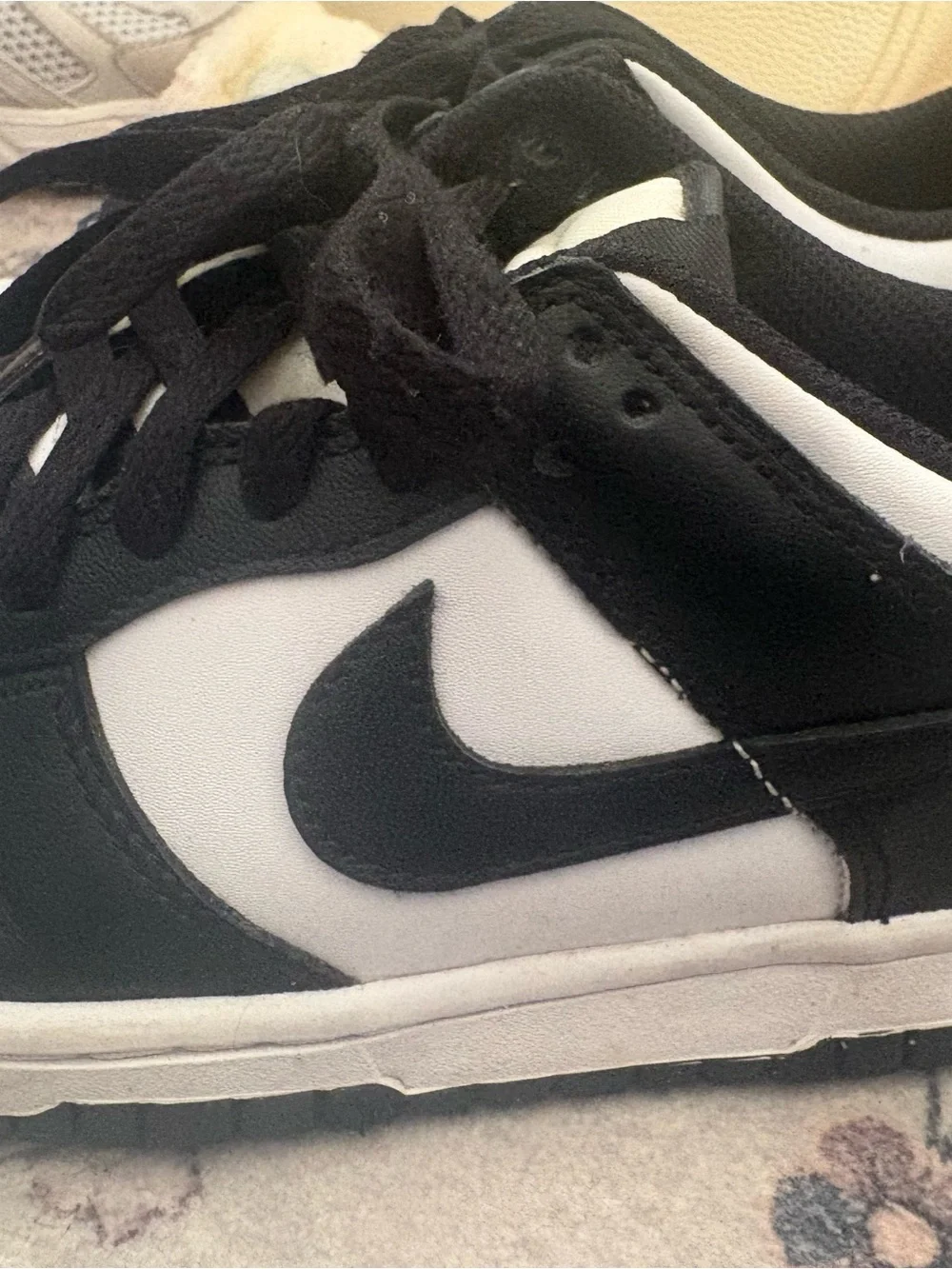 Nike women’s Black and White Low-Top Sneakers